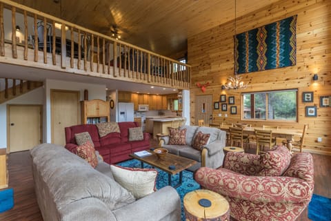 Open living room, kitchen and dining room.