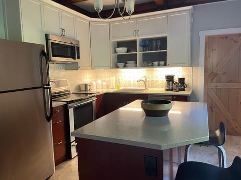 Three stools available at the island.