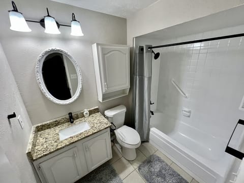 Combined shower/tub