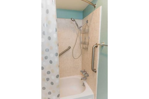 Combined shower/tub, hair dryer, towels, soap