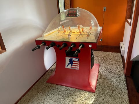 A bubble hockey table in the game room! USA vs Canada