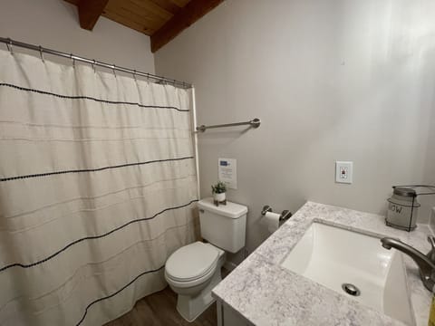 Combined shower/tub, hair dryer, towels, soap