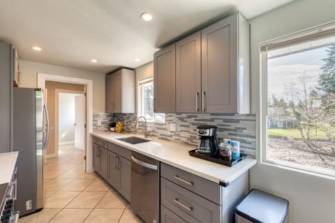 Modern cabinets with quartz countertop to prep and cook your meals!