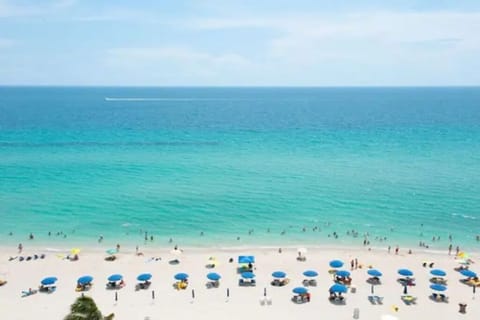 On the beach, sun loungers, beach towels