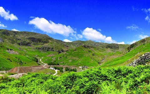 Sawyers Cottage Coppermines Valley from the mountainside above with Lake Distirct mountains behind