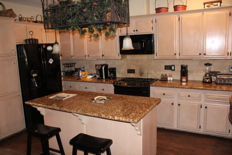 Kitchen has full size fridge, oven, microwave, dishwasher and coffee maker!