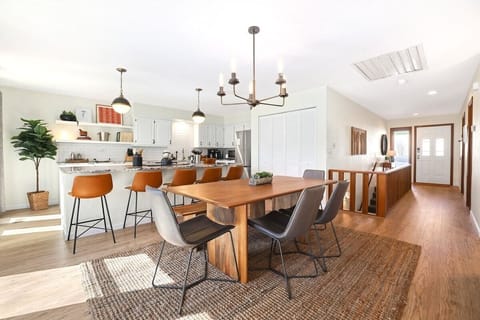 Directly to the right, you'll see our fully stocked kitchen with everything you need to whip up your favorite meal or baked goods.