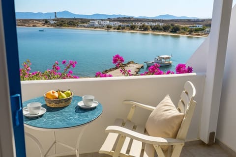 Relax with a stunning sea view from your private balcony, where the endless blue horizon meets gentle sea breezes—perfect for a morning coffee or sunset moment.