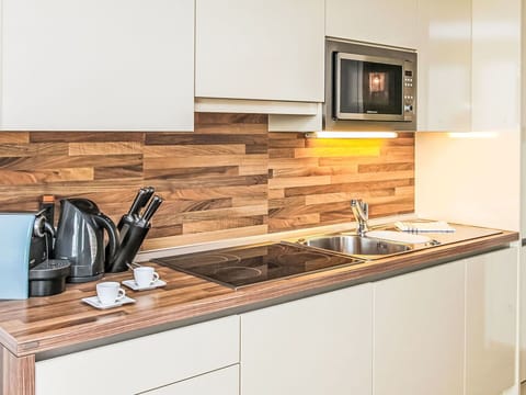 Countertop, Tap, Cabinetry, Kitchen Sink, Sink, Wood, Kitchen, Plumbing Fixture, Interior Design, Floor