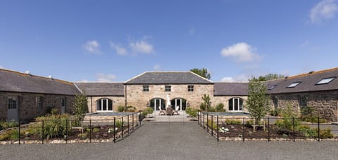 The Steading at West Lyham - large south-facing courtyard with two large water features