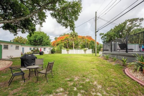 Shared gas grill in backyard.