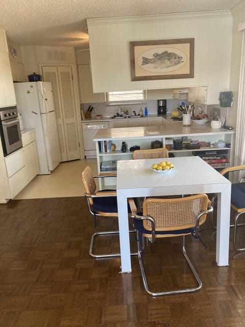 Dining nook opens to family room.