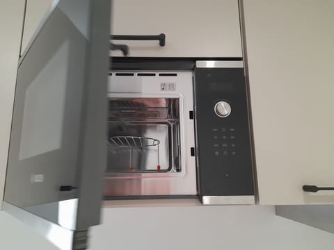 Microwave, stovetop, coffee/tea maker, toaster