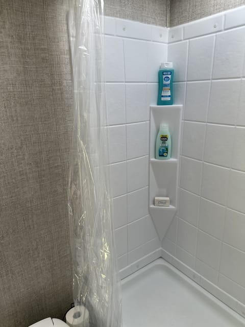 Shower, towels, soap, shampoo