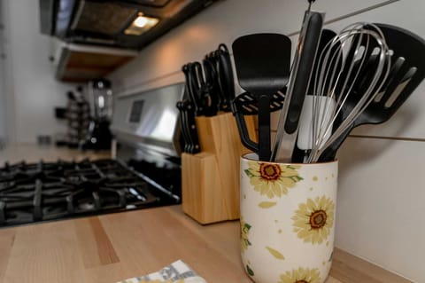 Whip up your favorite meals with ease—our kitchen is stocked with plenty of utensils for all your cooking needs. From prepping to plating, everything’s right at your fingertips, making it easy to feel at home in the heart of the kitchen.