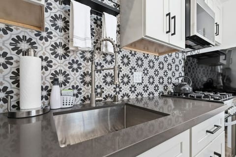 Quartz counters and tile back splash!
