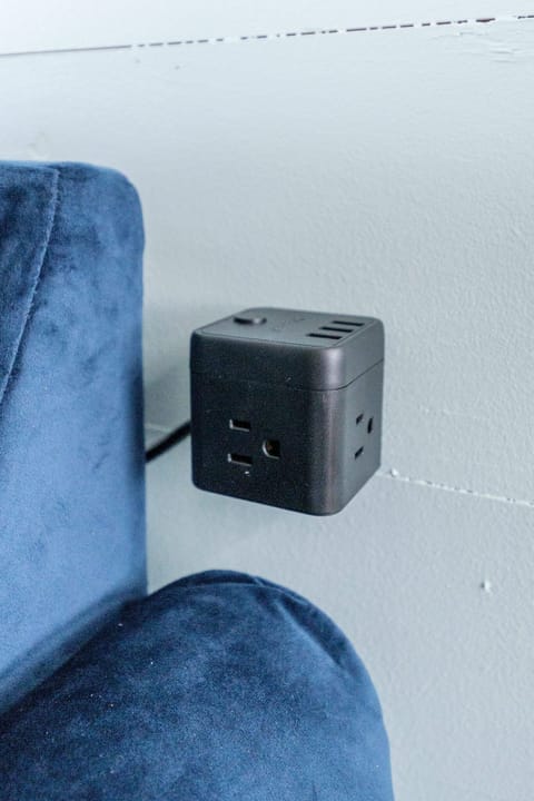 We have several of these strategically placed.  Charge from anywhere!