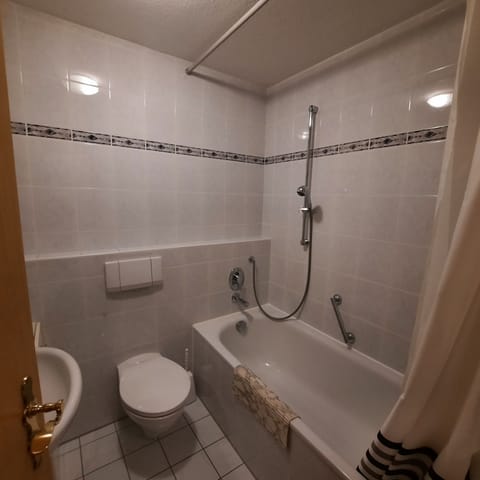 Combined shower/tub, soap, toilet paper