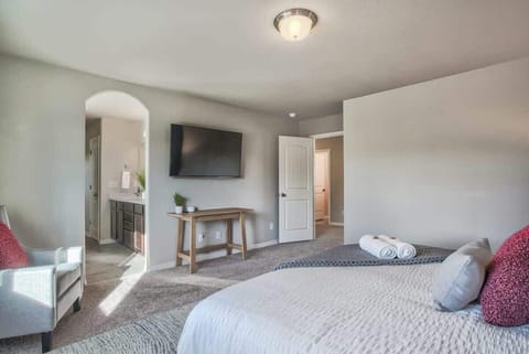 Experience the ultimate in entertainment and relaxation with a state-of-the-art Smart TV in our bedroom. Enjoy seamless access to your favorite shows, movies, and streaming platforms from the comfort of your own bed.