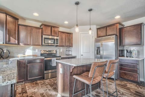 Fully stocked kitchen with all the cookware, dinnerware, drinkware, utensils, and all sorts of additional amenities readily available!