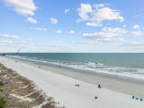 On the beach, sun loungers, beach towels