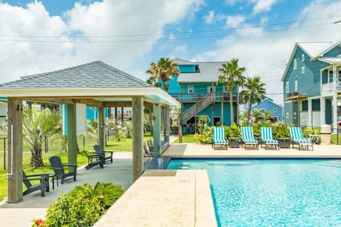 Lounge pool side or sit at the swim up bar