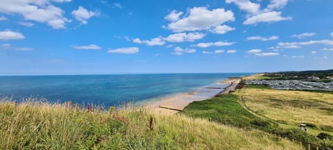 Beach nearby, sun loungers