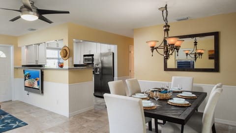 The dining area, kitchen and extra TV area...