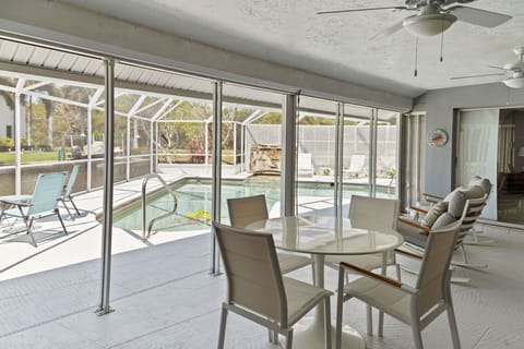 Lanai overlooking river and pool