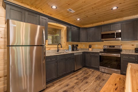 A fully equipped kitchen, perfect for preparing and enjoying home-cooked meals during your stay.