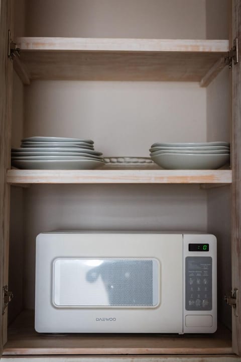 Fridge, microwave, oven, cookware/dishes/utensils