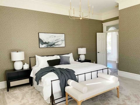 This room is great for someone with mobility issues needing to be on the first floor, with ample space. There’s also a twin daybed to lounge on!