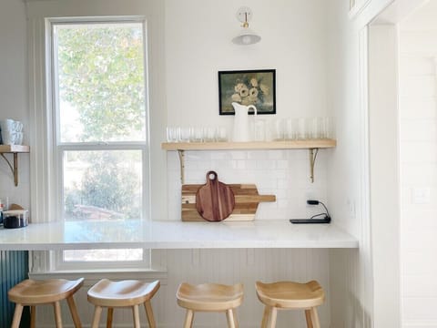 Large bar in the kitchen is useful for additional prep space as well as additional dining space.