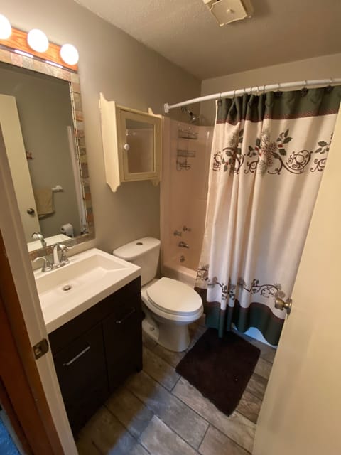 Combined shower/tub, towels, soap, toilet paper