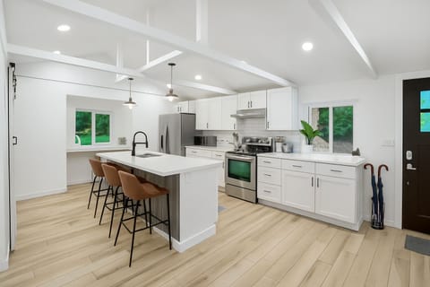Cook, connect, and create memories in this airy, fully equipped kitchen