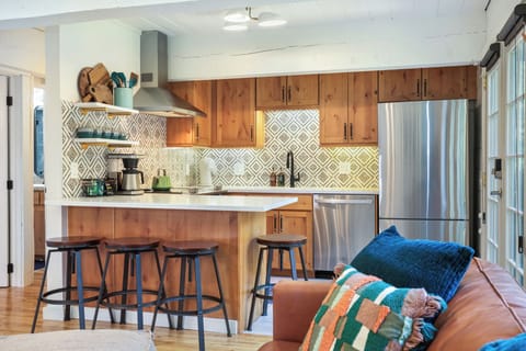 Full kitchen with seating for four.