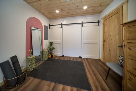 The spacious bunk room boasts plenty of room to practice your yoga