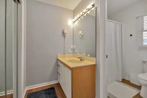 Combined shower/tub, hair dryer, towels, toilet paper