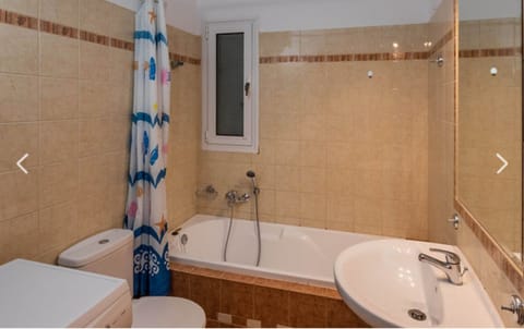 Combined shower/tub, hair dryer, towels, soap