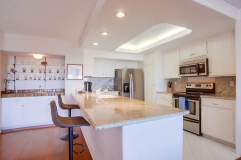 Spacious kitchen with a large island, perfect for a nice home cooked meal!