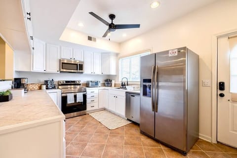 Spacious kitchen with plenty of cabinets and counter space.