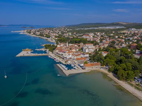 Water, Sky, Cloud, Water Resources, Azure, Tree, Natural Landscape, Beach, Coastal And Oceanic Landforms, Plant