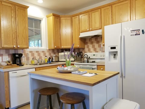 Fridge, microwave, dishwasher, dining tables