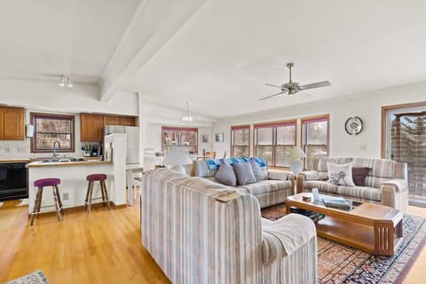 The open-concept layout makes for easy movement between the living, kitchen and dining spaces and serves up several seating zones for games, dining, snacking and lounging.