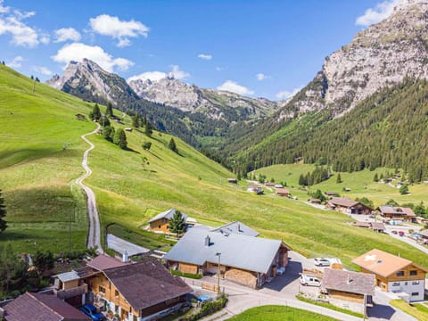 Cloud, Sky, Mountain, Ecoregion, Green, Natural Landscape, Nature, Highland, Natural Environment, Slope