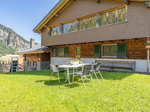 Building, Property, Plant, Table, Window, Sky, House, Shade, Land Lot, Outdoor Table