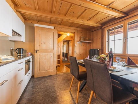 Furniture, Cabinetry, Property, Window, Table, Wood, Chair, Countertop, Drawer, Lighting