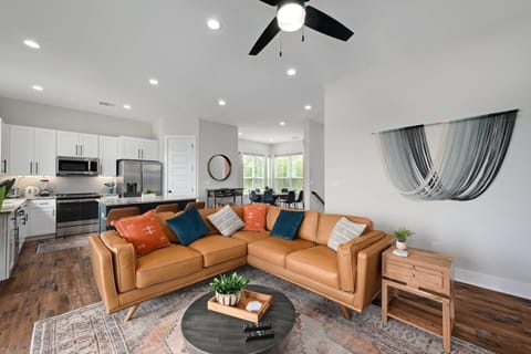 Open concept living, kitchen and dining spaces.