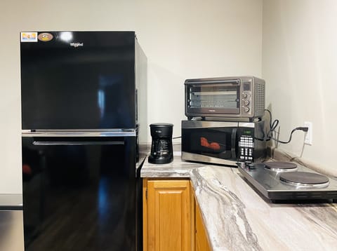 Fridge, microwave, coffee/tea maker, toaster