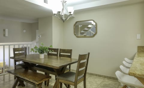 Extended table and chair set for family and friends to gather.